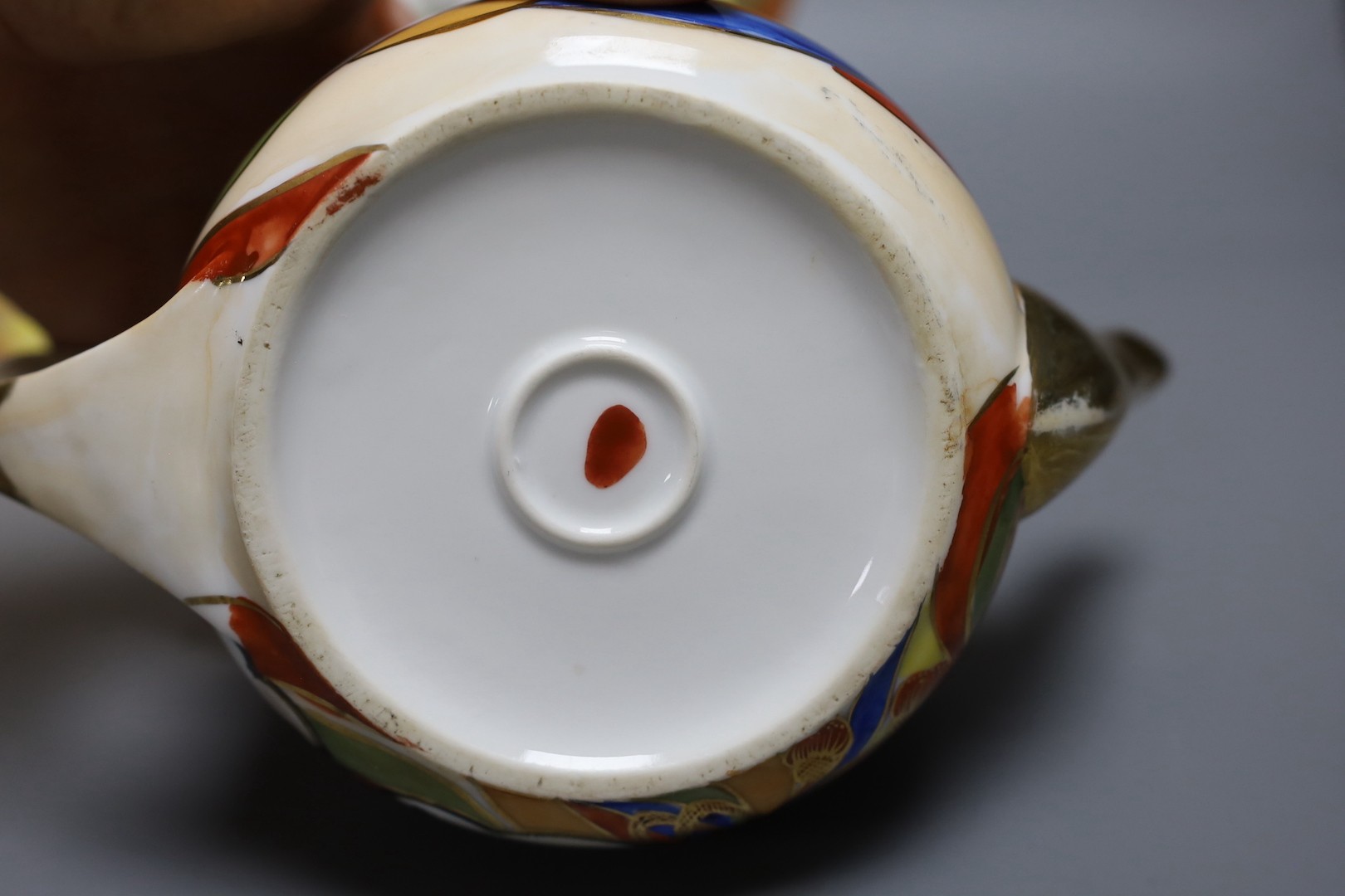 A Japanese Kutani porcelain teaset for 10 and a Japanese floral teapot